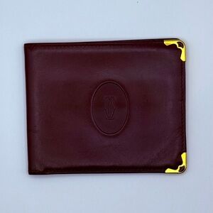 Must de Cartier leather bifold wallet